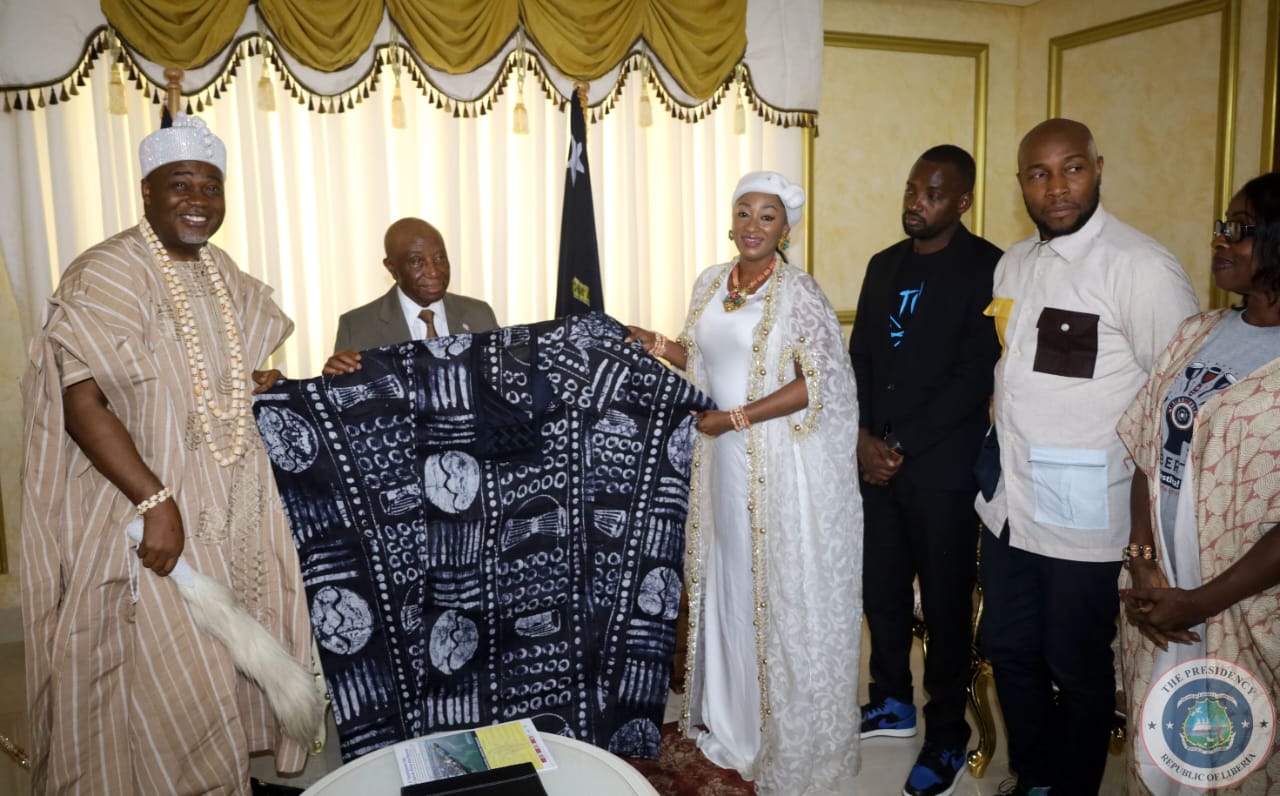 LIBERIA PRESIDENT HONOURED NIGERIANS