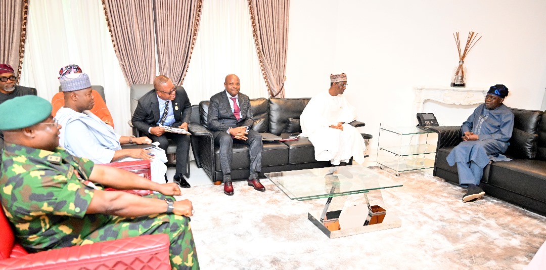 TINUBU WITH SECURITY CHIEFS