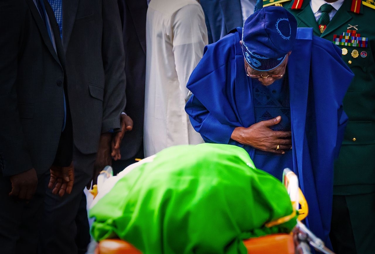 TINUBU WITH BUHARI BODY