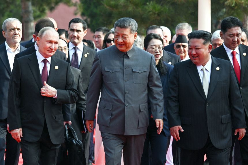 CHINESE LEADER WITH OTHERS